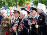 Кадры Дня Победы в Белгороде: парад и «Бессмертный полк» - Изображение 27
