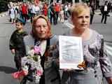 Кадры Дня Победы в Белгороде: парад и «Бессмертный полк» - Изображение 42