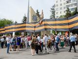Кадры Дня Победы в Белгороде: парад и «Бессмертный полк» - Изображение 14